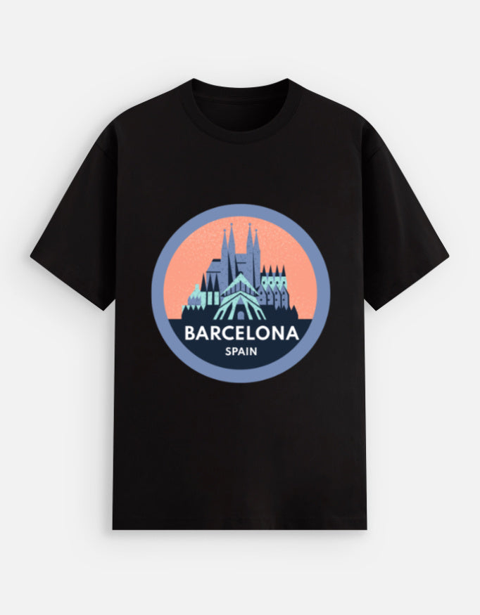 Black t-shirt with Barcelona, Spain graphic on a light blue background