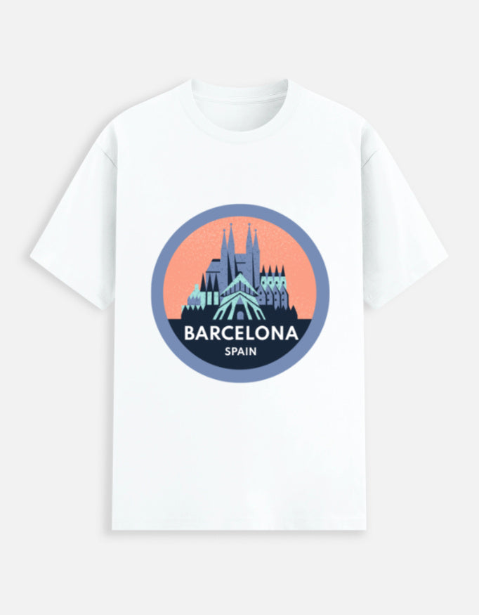 White t-shirt with Barcelona, Spain graphic on a light blue background